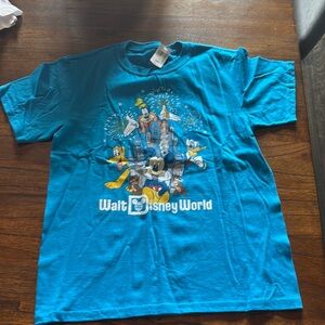 Blue Disney T-Shirt with characters on it. Size is youth large